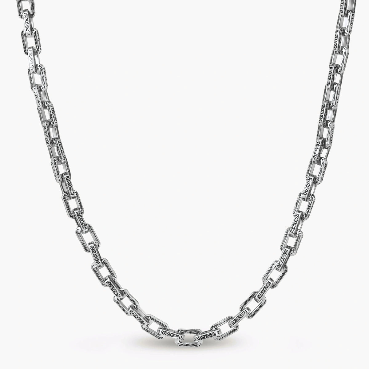 Silver 316L stainless steel rectangular link chain necklace with intricate scroll engravings, 560mm length, 7.1mm width.