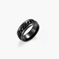 Black PVD-plated stainless steel band ring with a rotating Cuban chain center strip and ridged edges, 8mm wide.