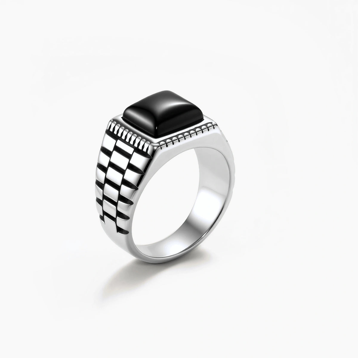 Silver stainless steel signet ring with checkered band texture, beaded border, and square black onyx cabochon stone center.